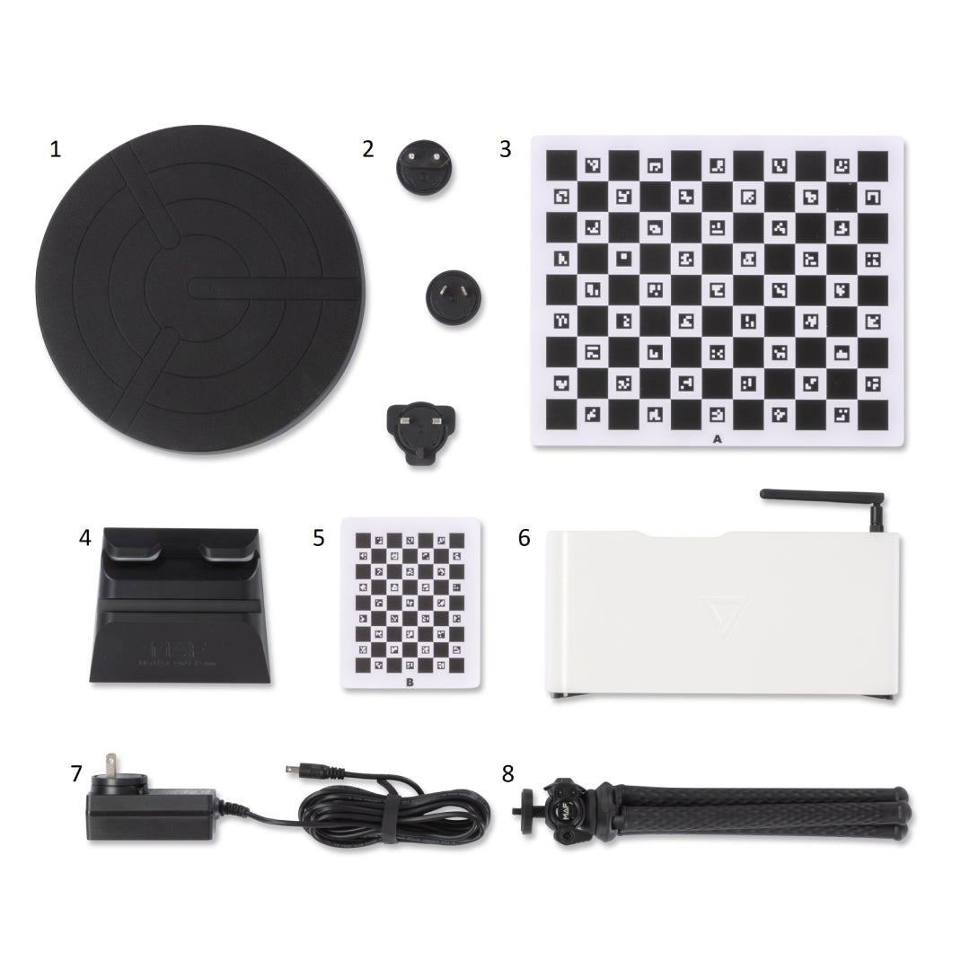 Everything included with THREE Rotating scanner bed, two calibration cards, freestanding tripod, ac Adapter